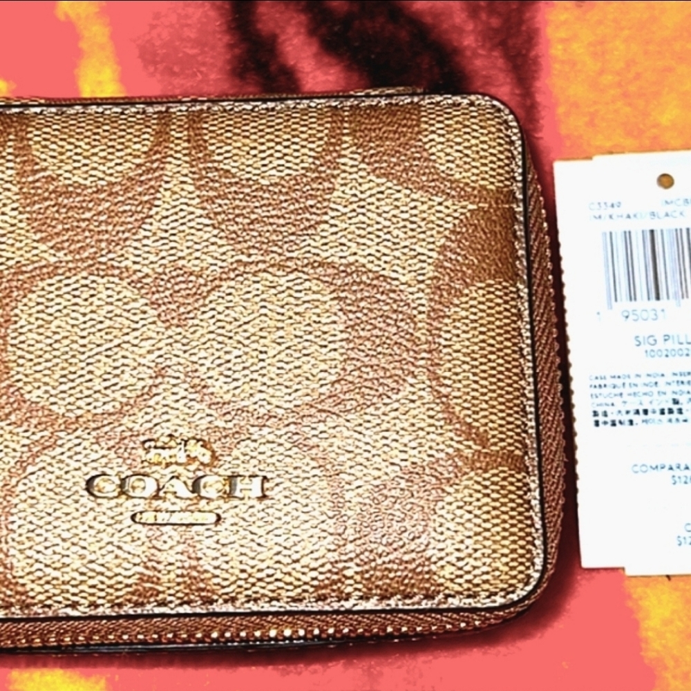 Coach pill case
